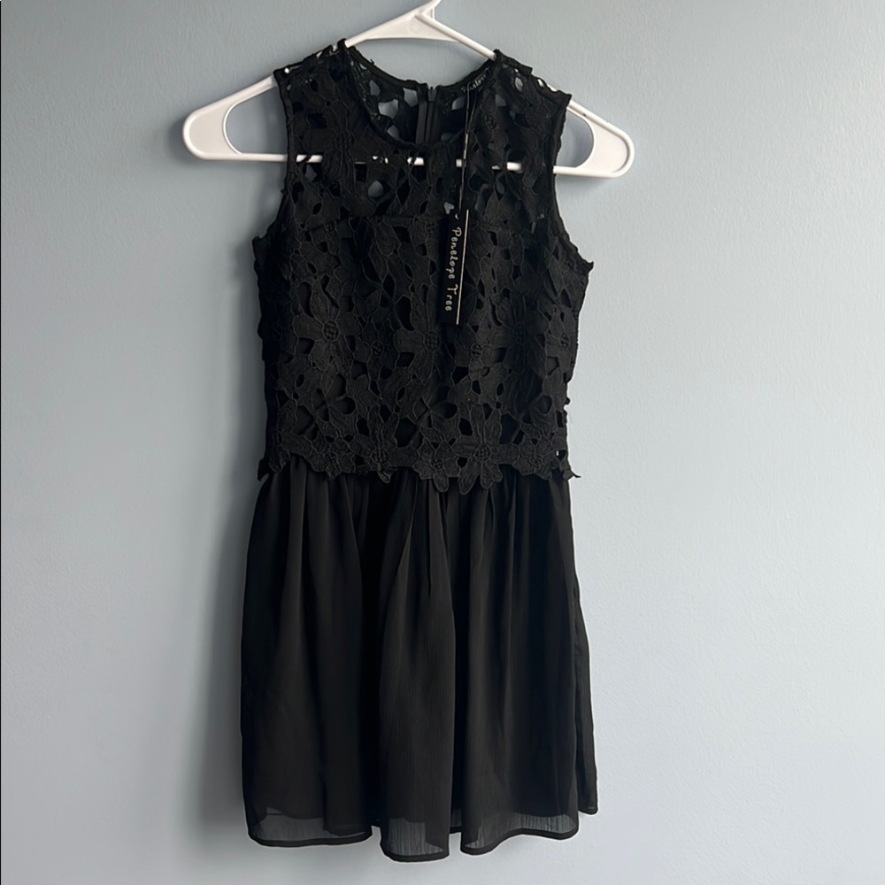 Elegant Black Sleeveless Fit and Flare Cocktail Dress